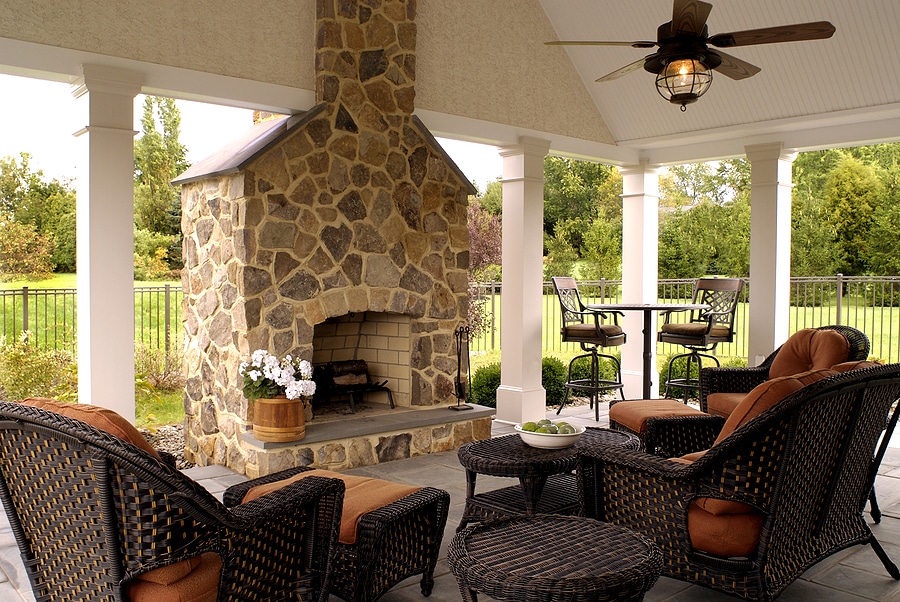 Create a Cozy Oasis with a Custom Pavilion and Outdoor Fireplace