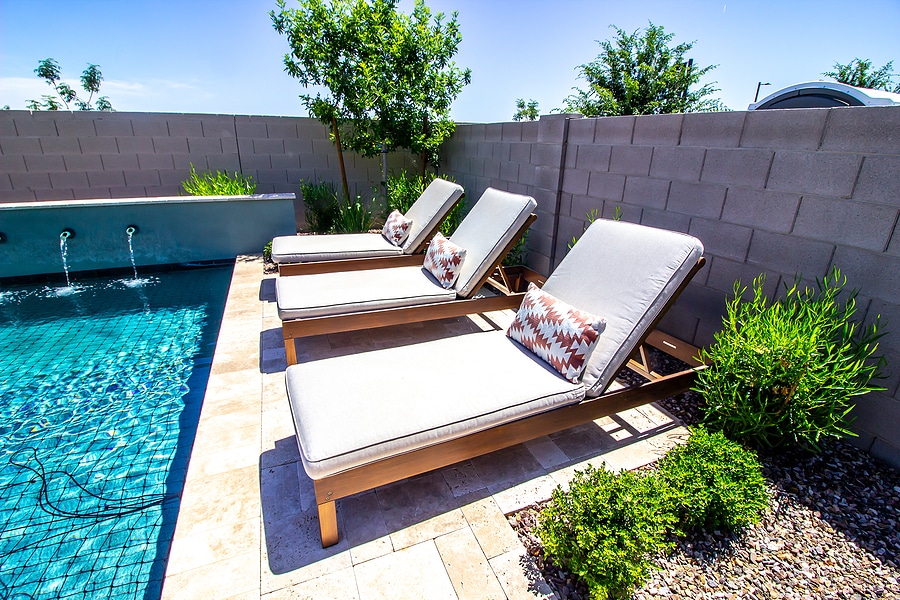 Best Hardscaping Features to Add Around a Fiberglass Pool